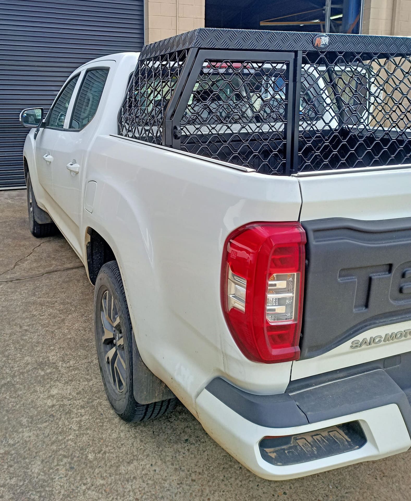 Shows the side profile on an installed bulldog ute cage